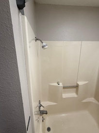The shower head was very low . I had to bend down and I am 5ft 4 to get my head wet