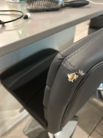 All of the barstools have holes like this