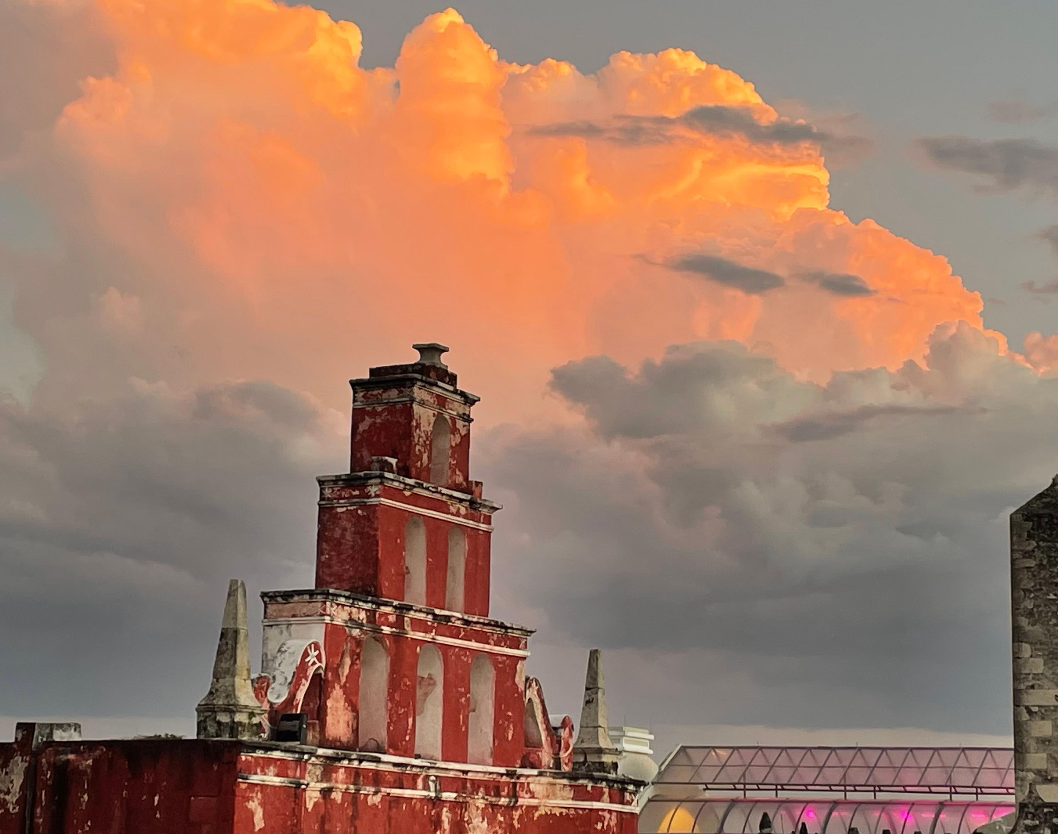 sunset through the arches at the pool