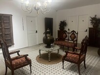 Petit salon sur le palier du premier étage sur lequel débouche plusieurs chambres