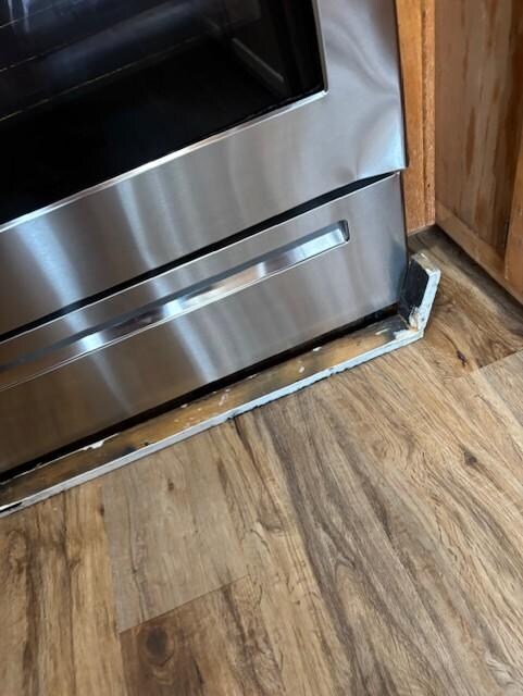 Broken front panel on stove