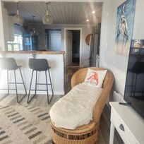 Comfy lounger in the living room. Internet TV is included. Nice sunny room.