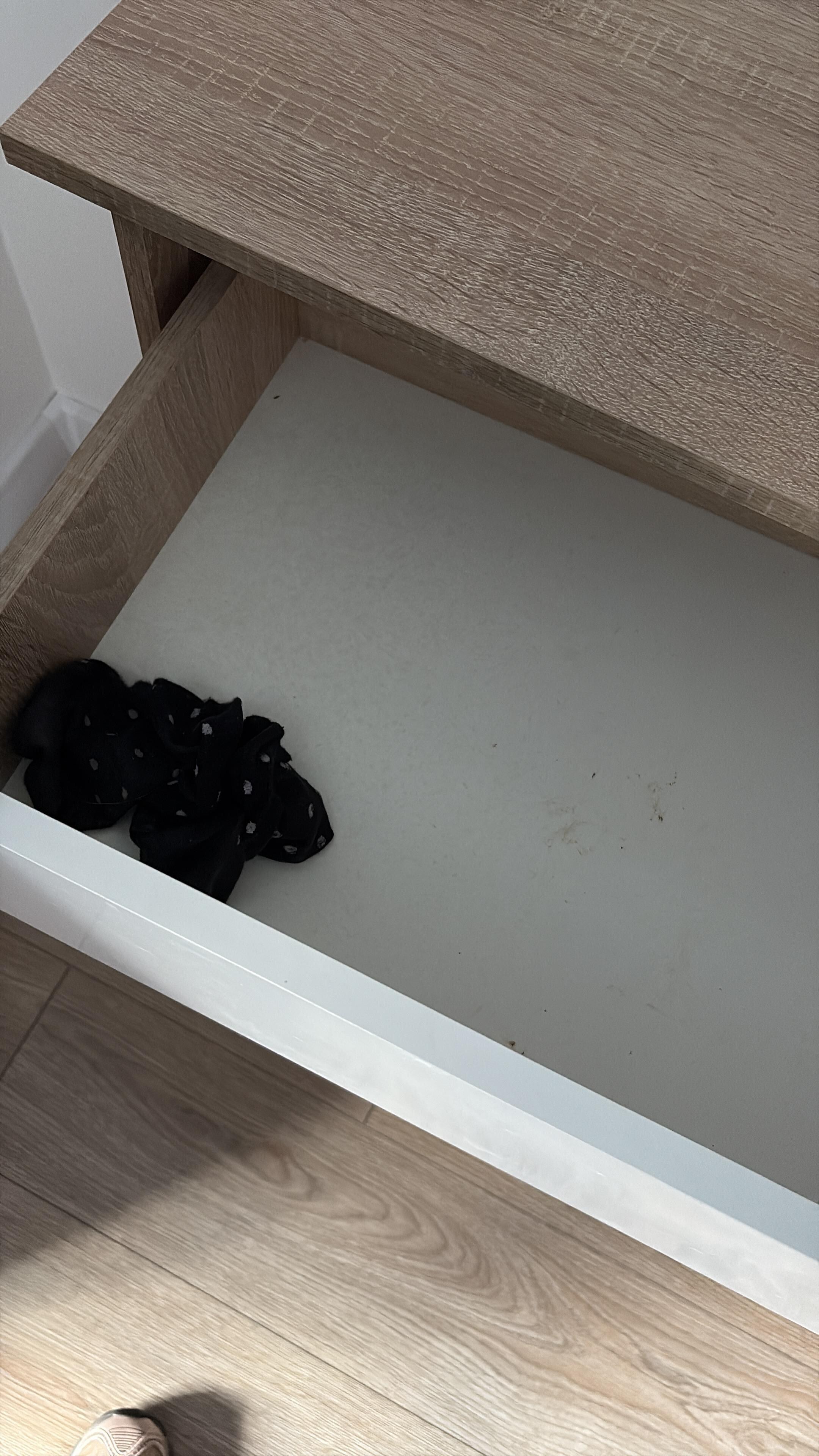 Leftover dirty socks in the cabinet