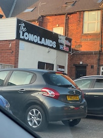 Youths in car bark in groups drinking and shouting