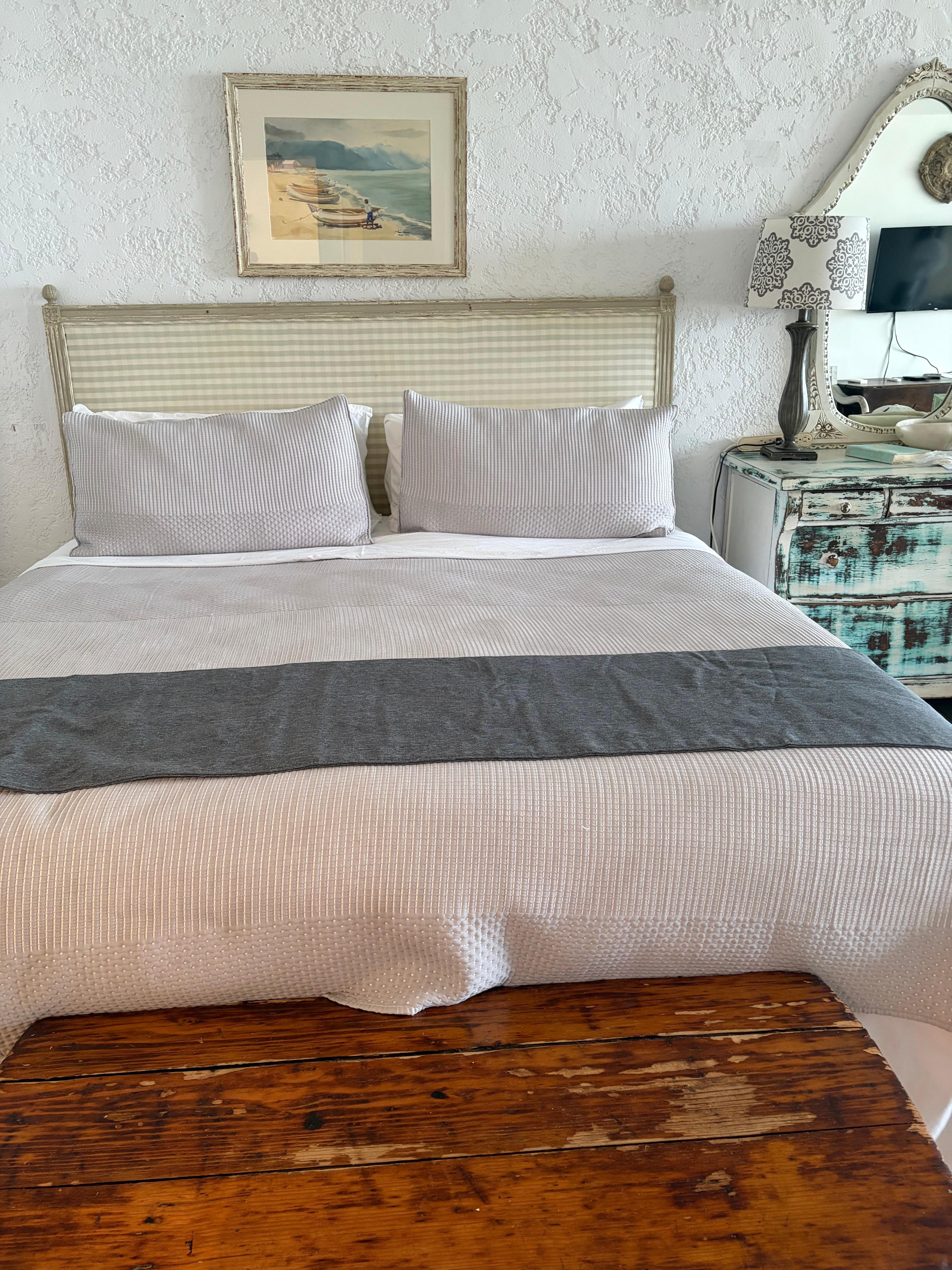 Bed looks nice but mattress and pillows aren’t in the best shape