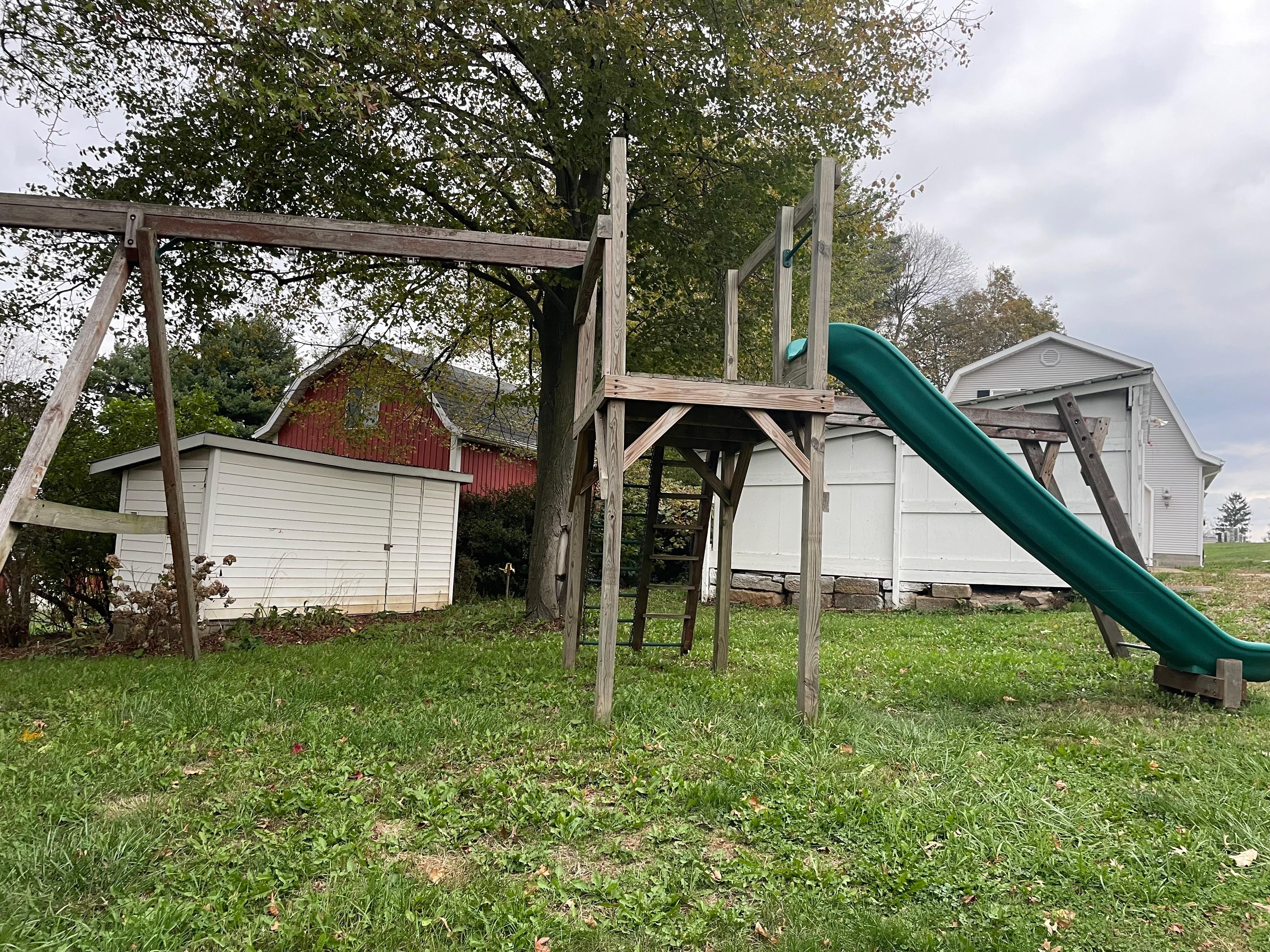The play structure that the kids got wore themselves out on. 