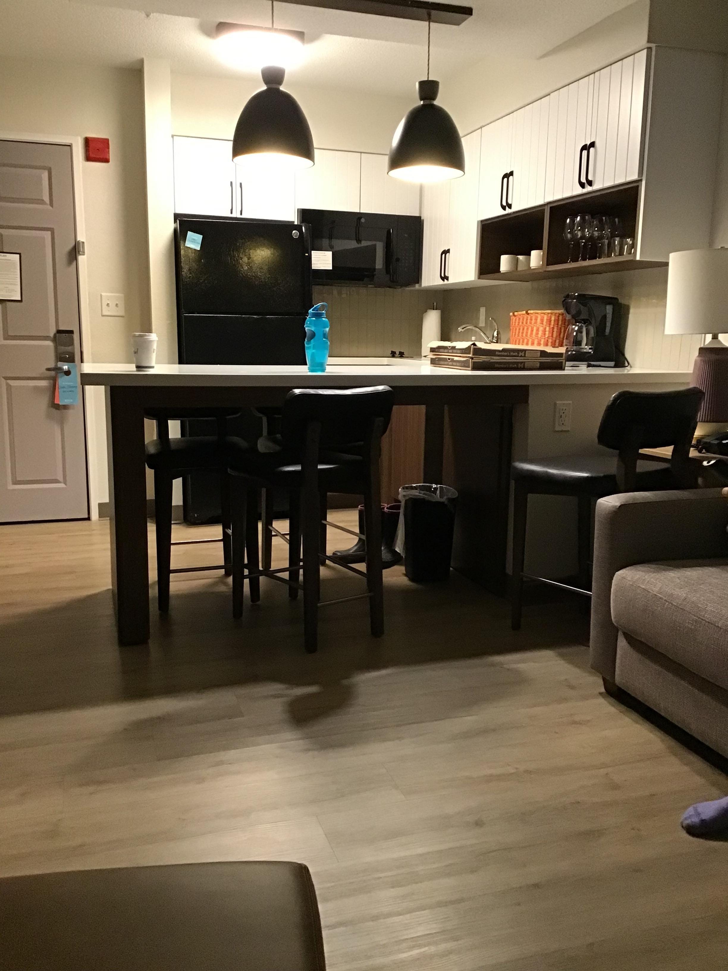 The kitchen is beautiful with a full size fridge and a stovetop and microwave. So nice 