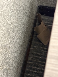 dirty and paper was on side of the night stand