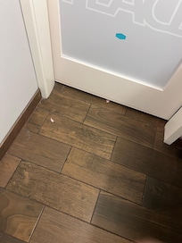 Candy wrappers on bathroom floor