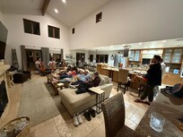 Two grandchildren and a fiance play a cello concert, including an arrangement of Happy Birthday written by the youngest.