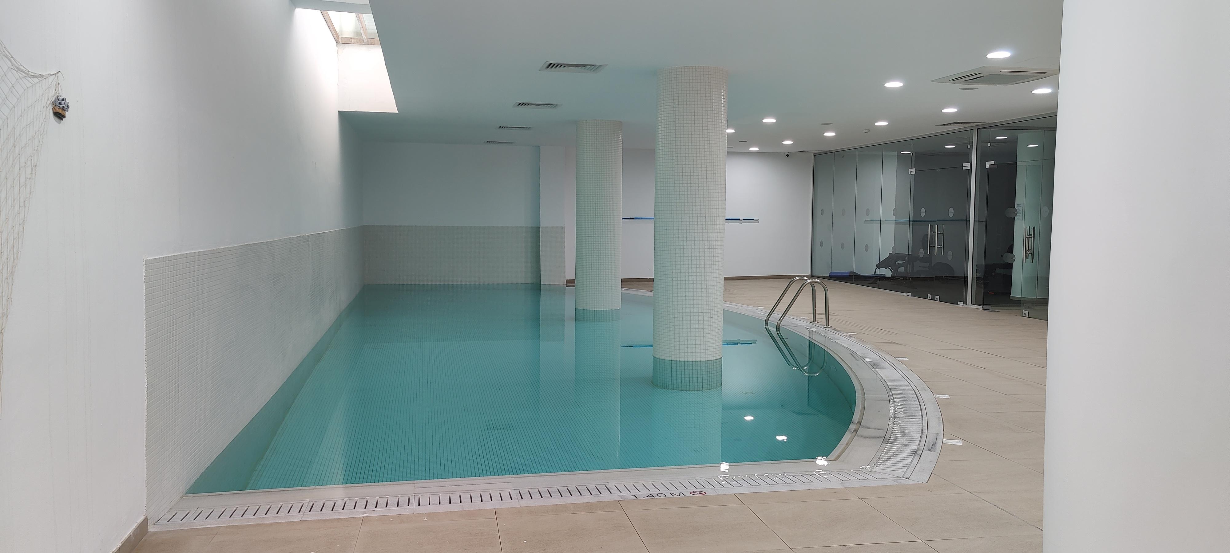 Indoor pool next to the gym