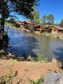 The lake to the left of the cabin.