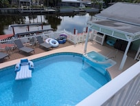 Second floor deck view of pool