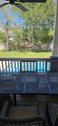 Covered porch overlooking the pool