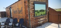 Large fenced patio with gas grill & seating