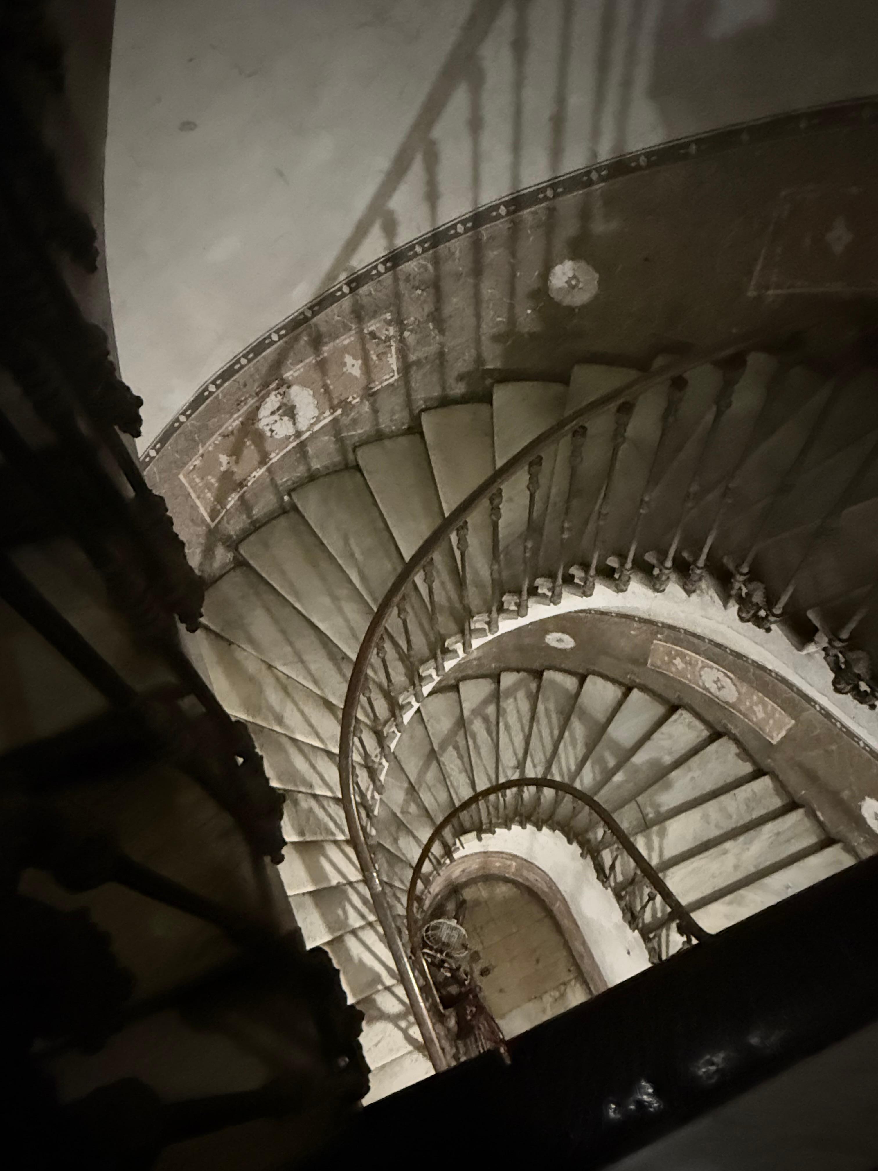Stunning staircase that generations have walked up and down. Be quiet, most people here are residents.