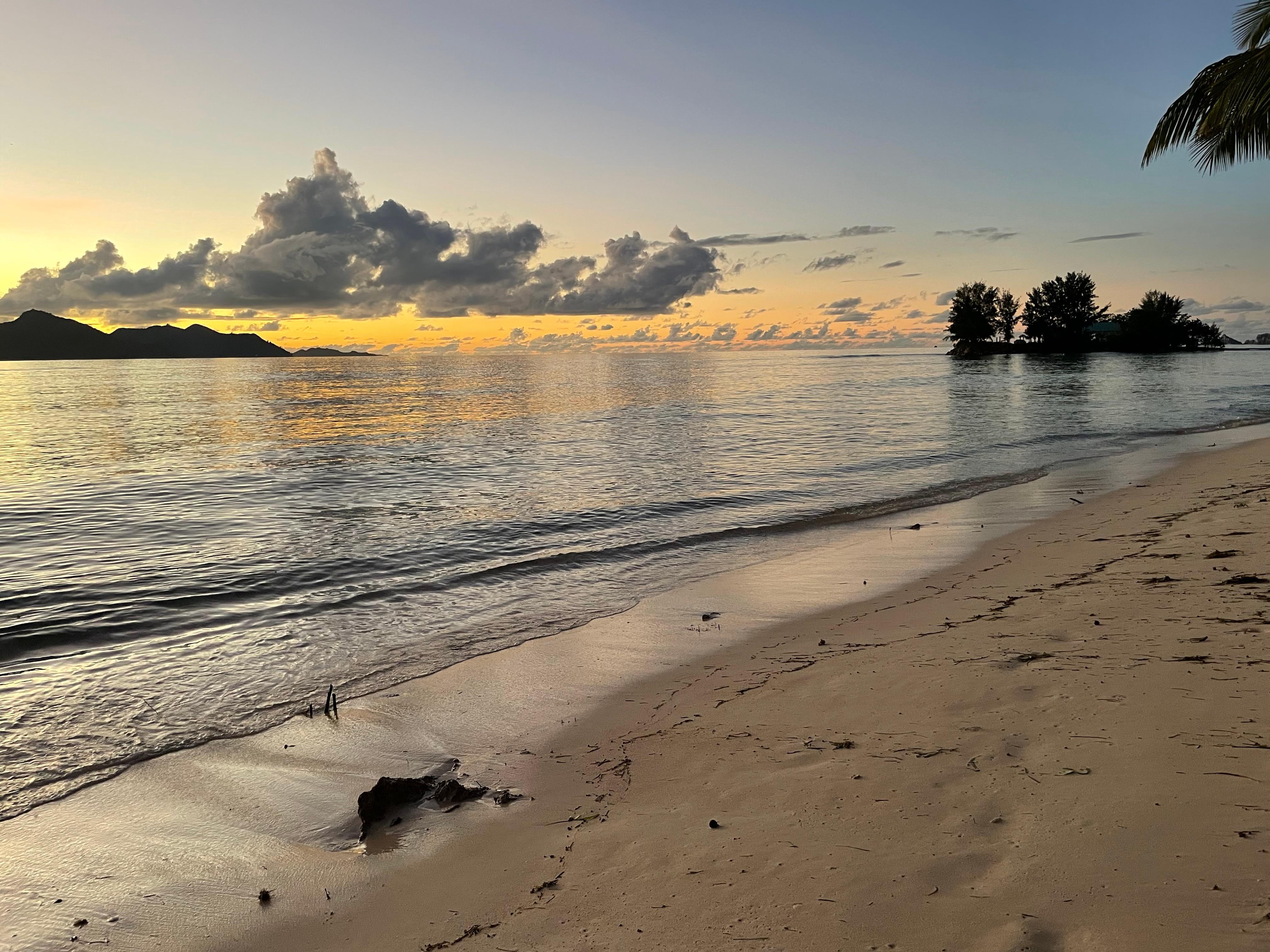 Beach at sunset at the hotel