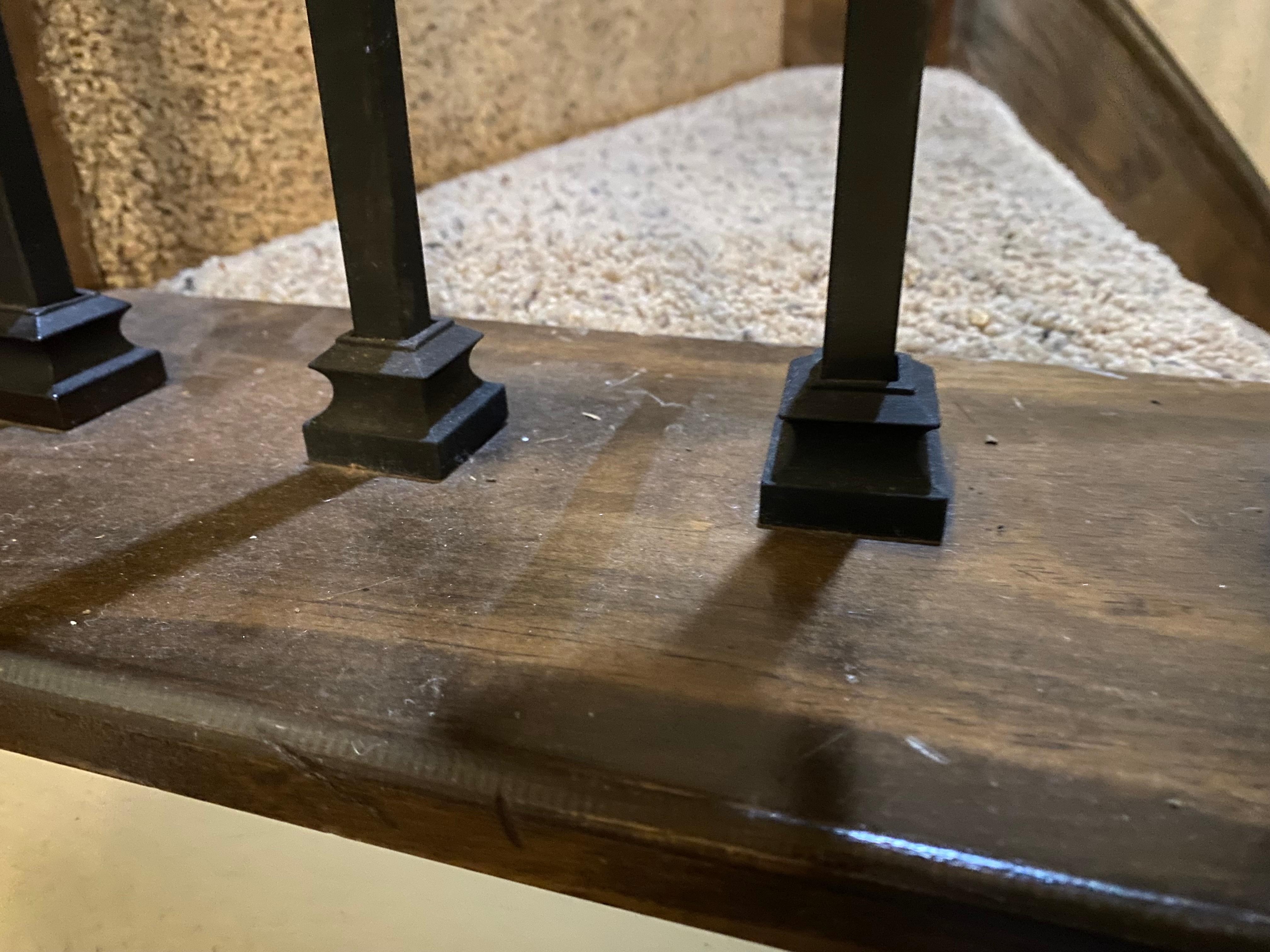 Dust on Stair Rail-Indicative of total absence of professional cleaning