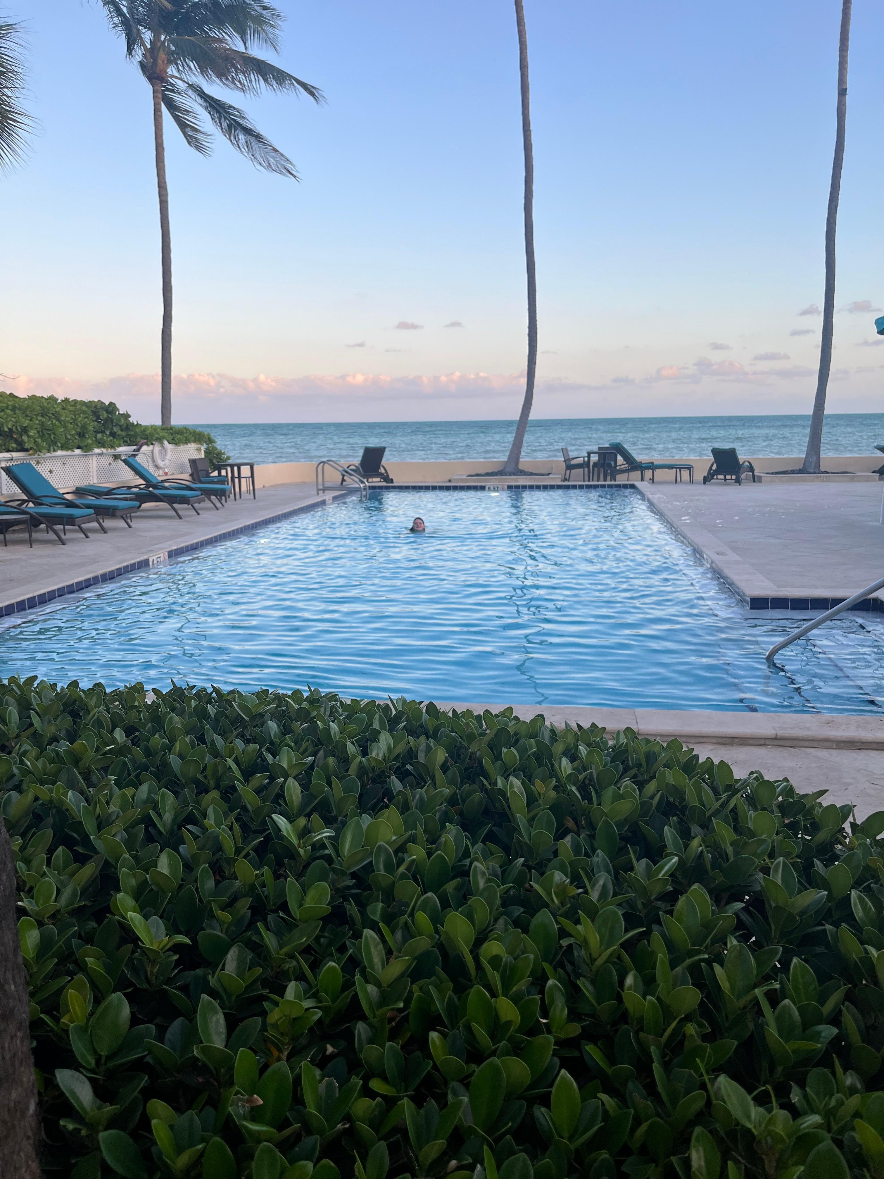 Heated pool, right on the water. Gorgeous. There is also a small, but very nice, workout building.