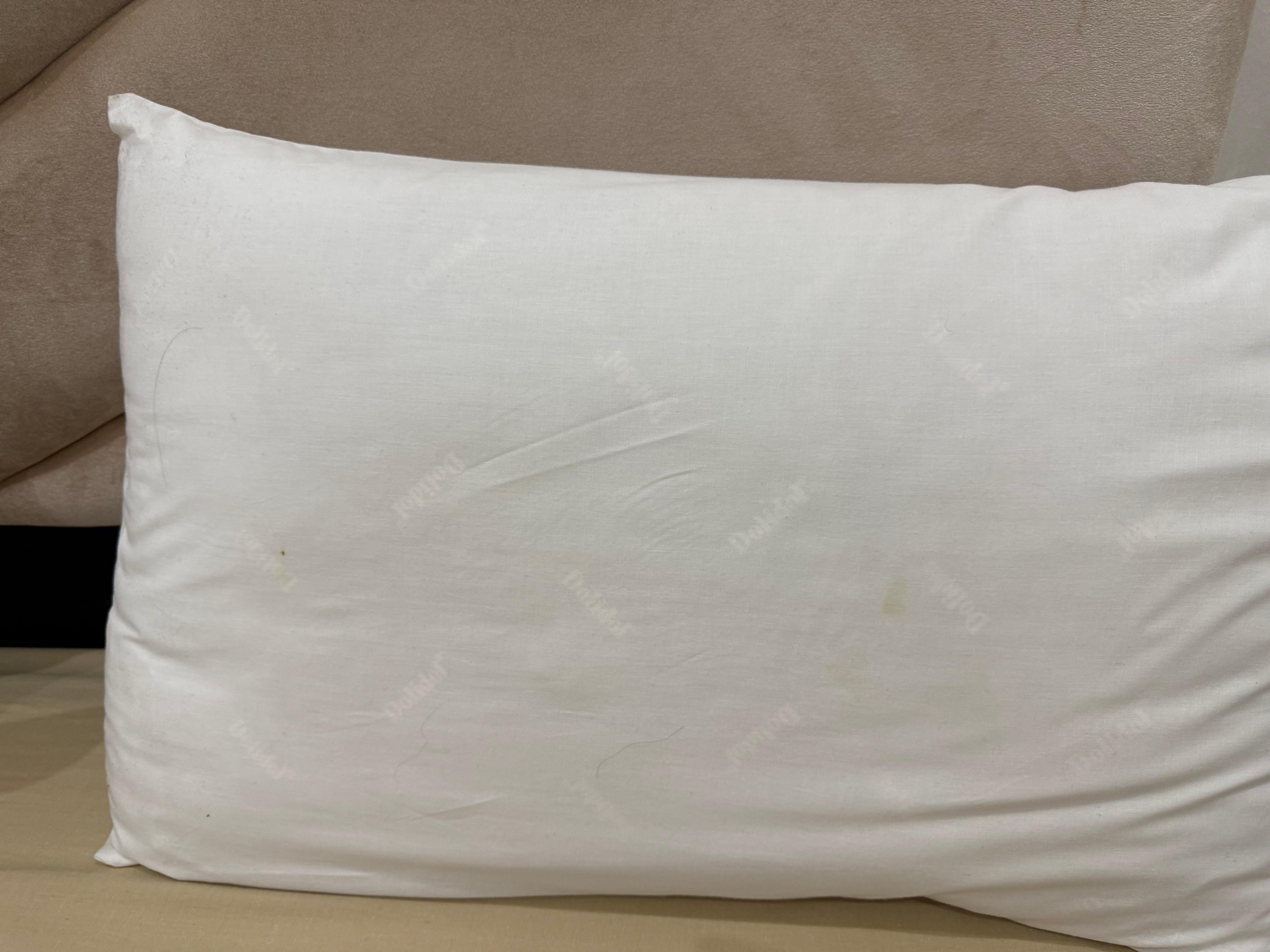 Hair and stains on pillowcase