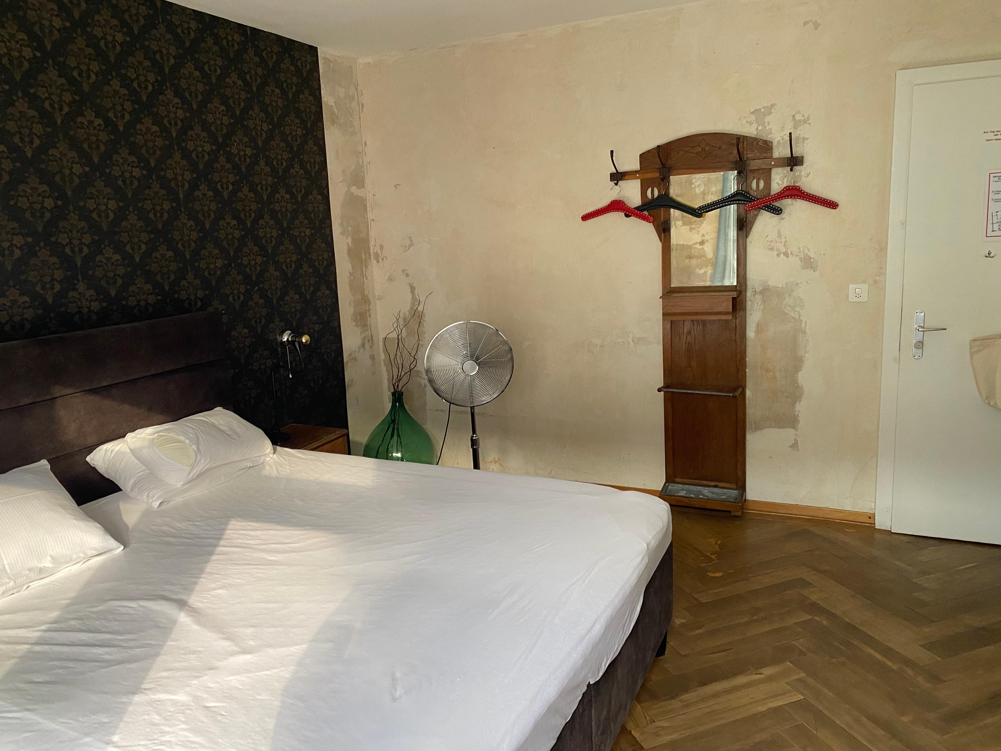 Rough looking walls and makeshift furniture