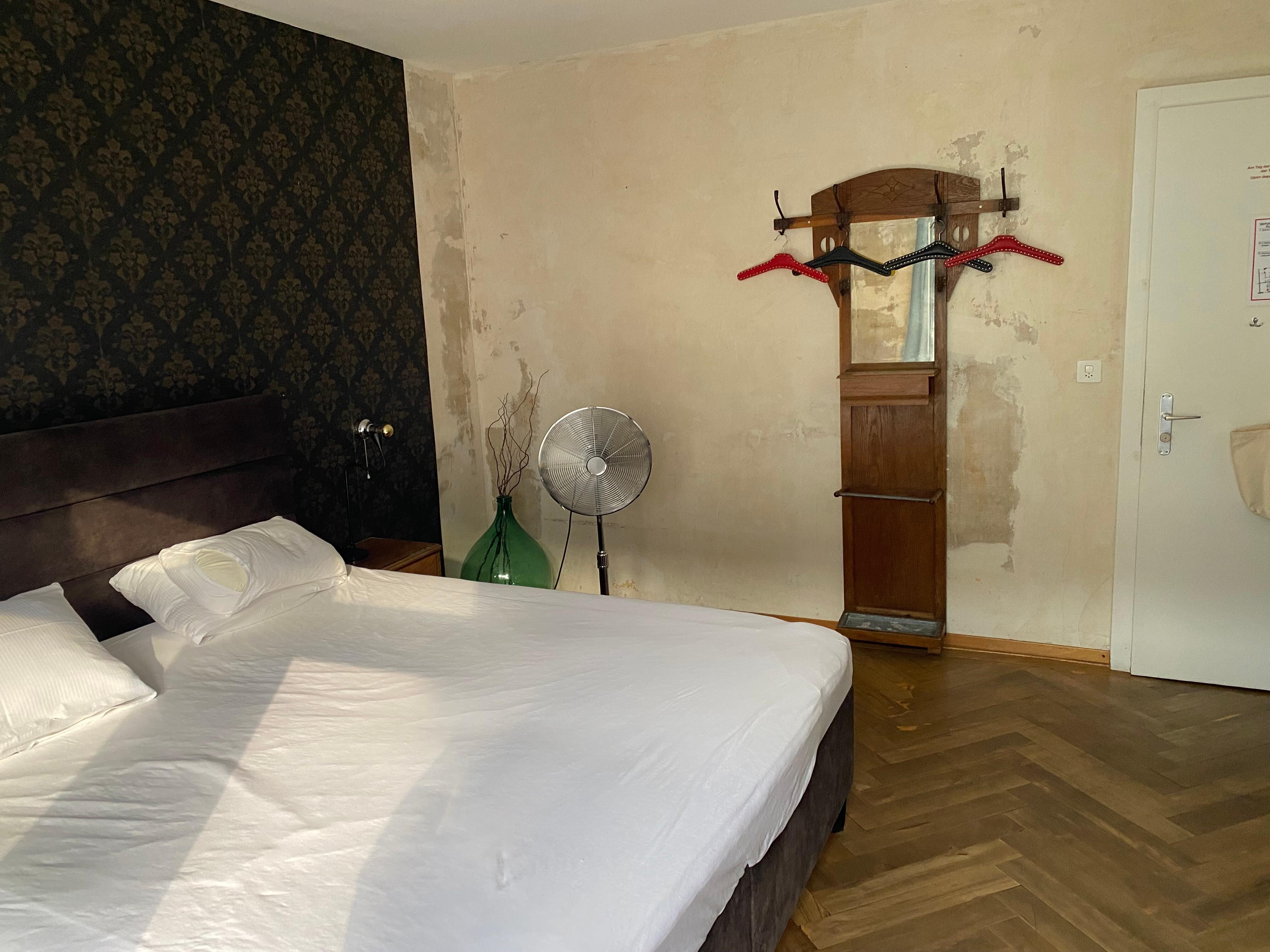 Rough looking walls and makeshift furniture