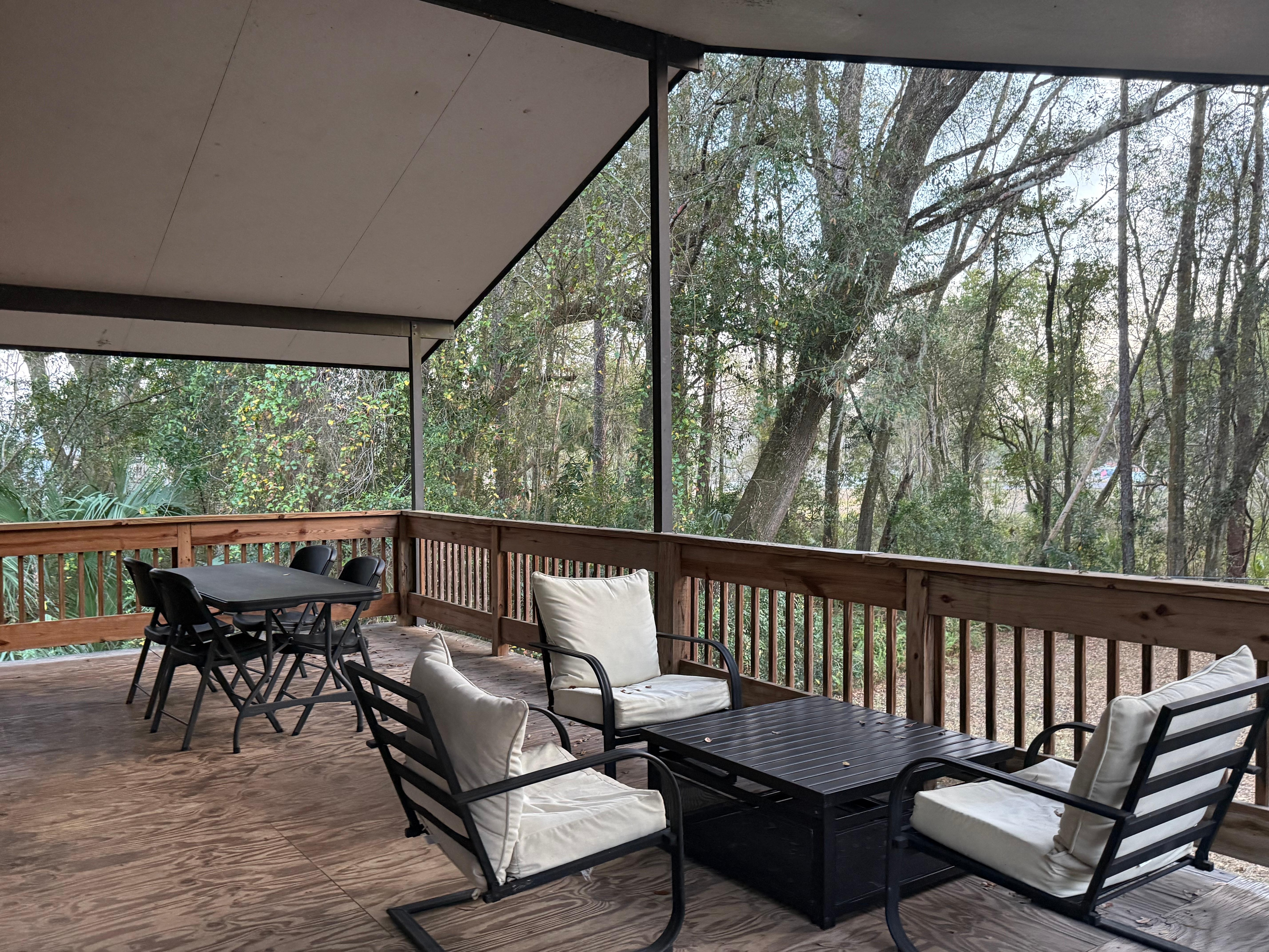 Beautiful deck area looking over open wooded area