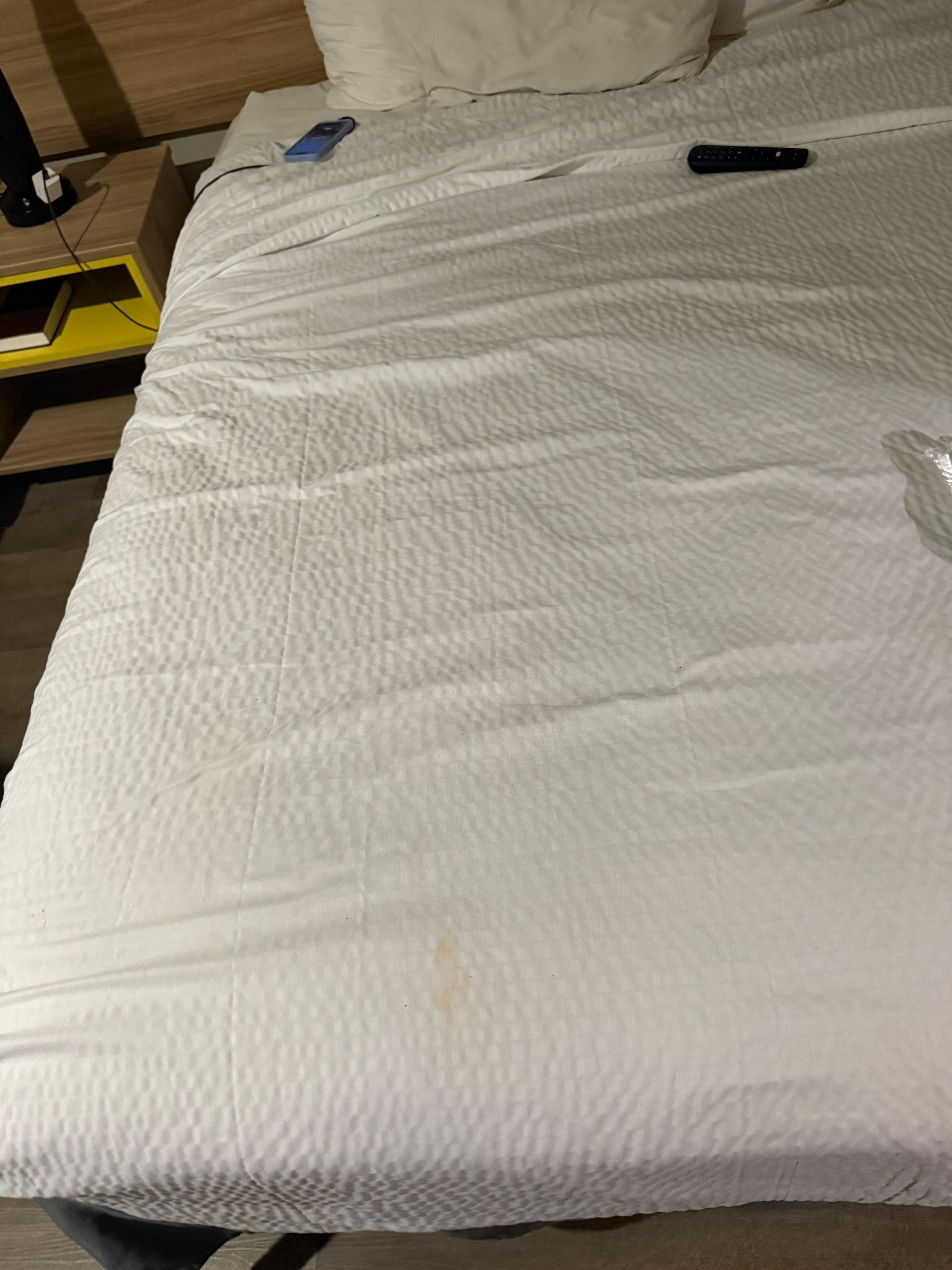 Stained bed cover