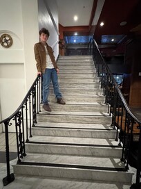 When we were there, many high school students took their pictures in the lobby and up that stairway. So we duplicated the look in regular street clothes.