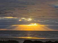 Sunrise from deck of house.