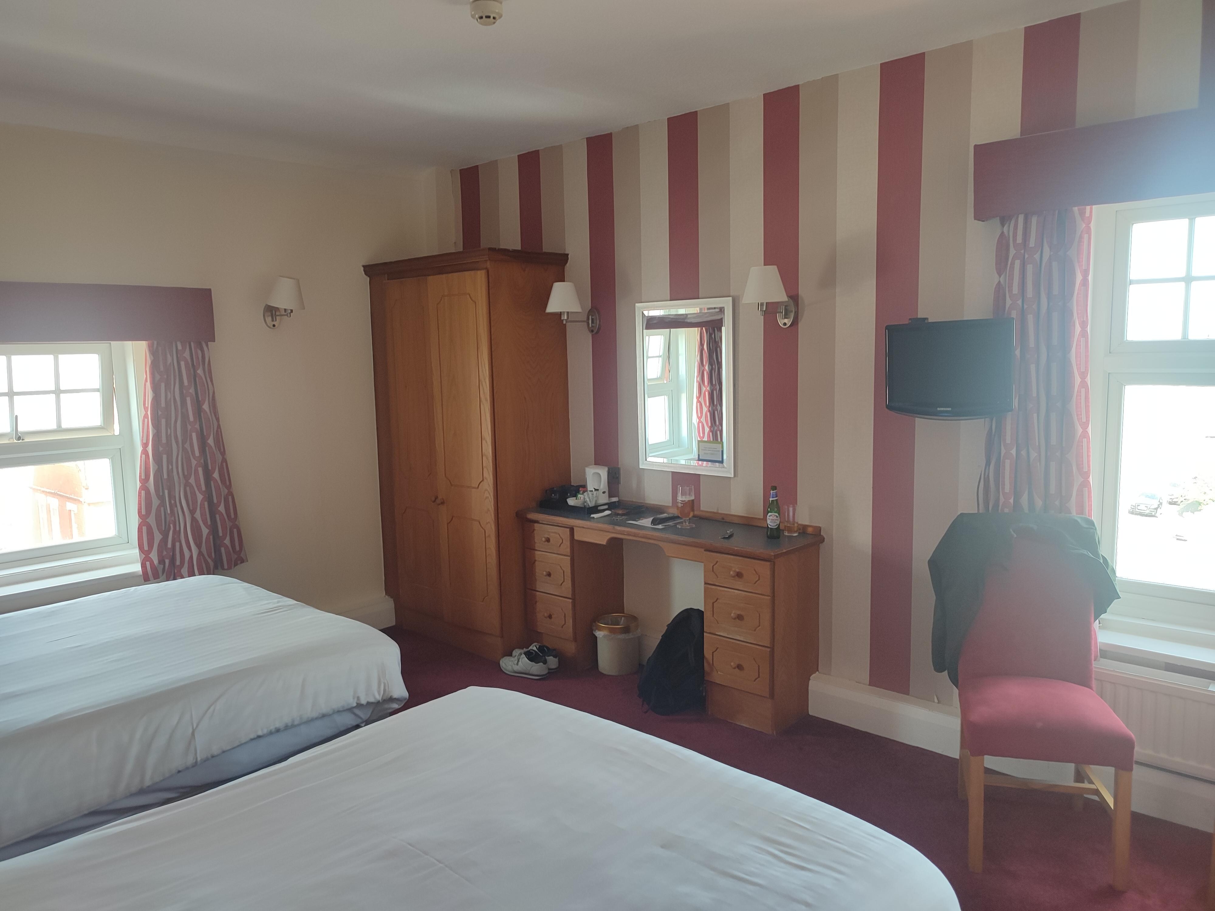 Twin Beds (2 x double beds), corner room dual aspect windows. 