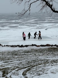 Youngest of the bunch out playing on the ice.