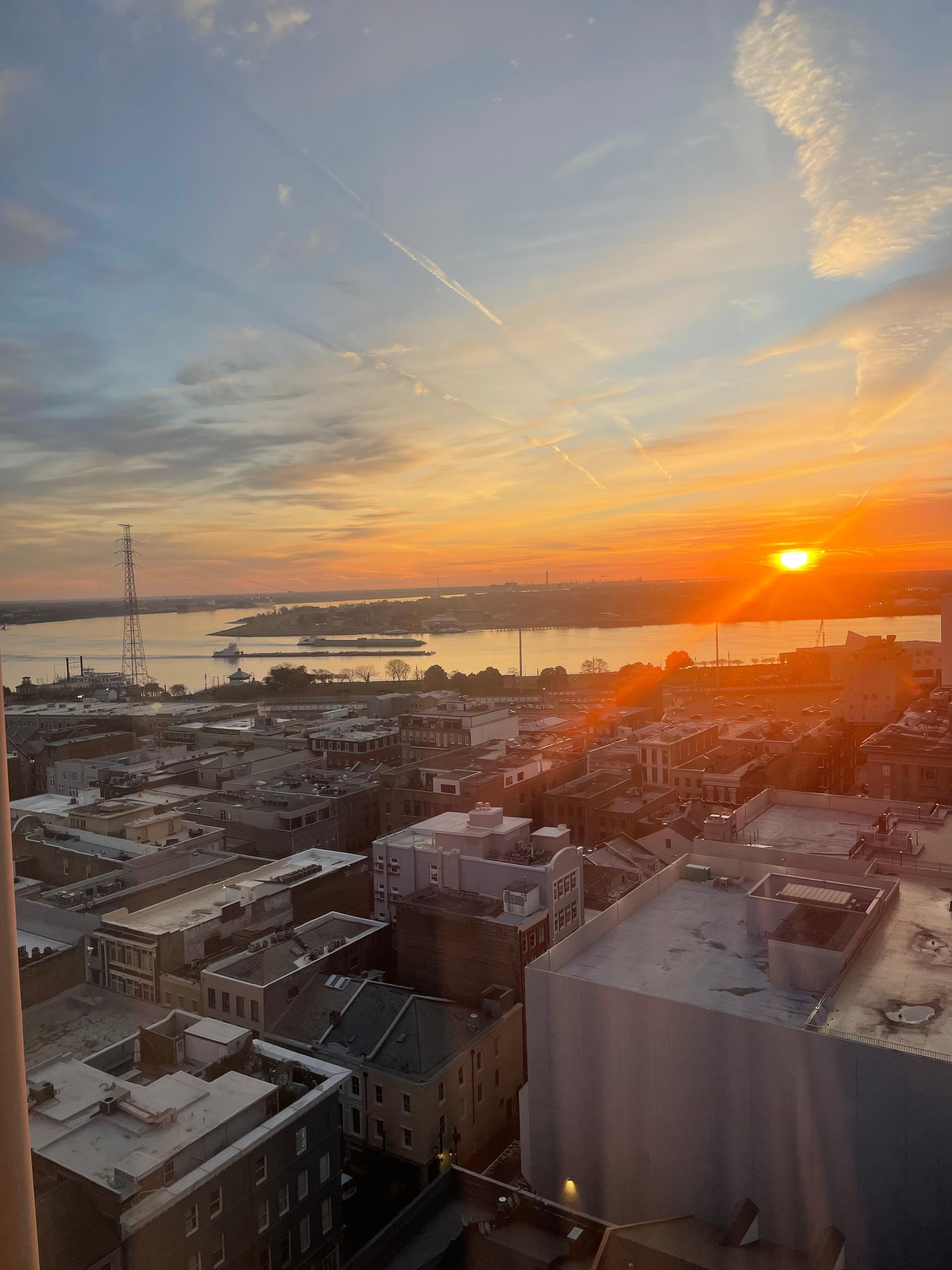 View of sunrise over the Mississippi River from room in 20th gloor.