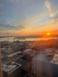 View of sunrise over the Mississippi River from room in 20th gloor.