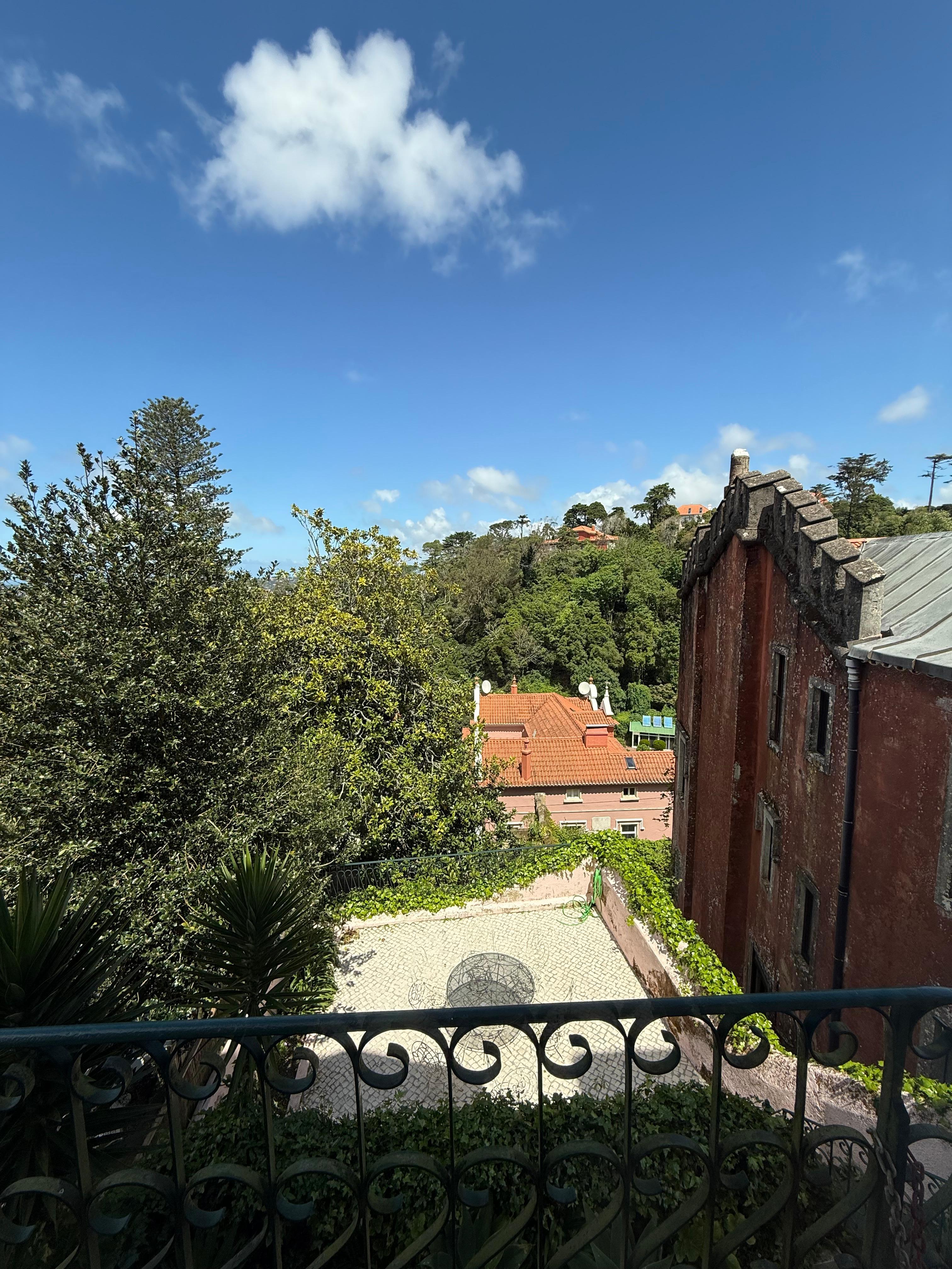 View from the balcony. You can see a patio below accessible by 2 flights of stairs.