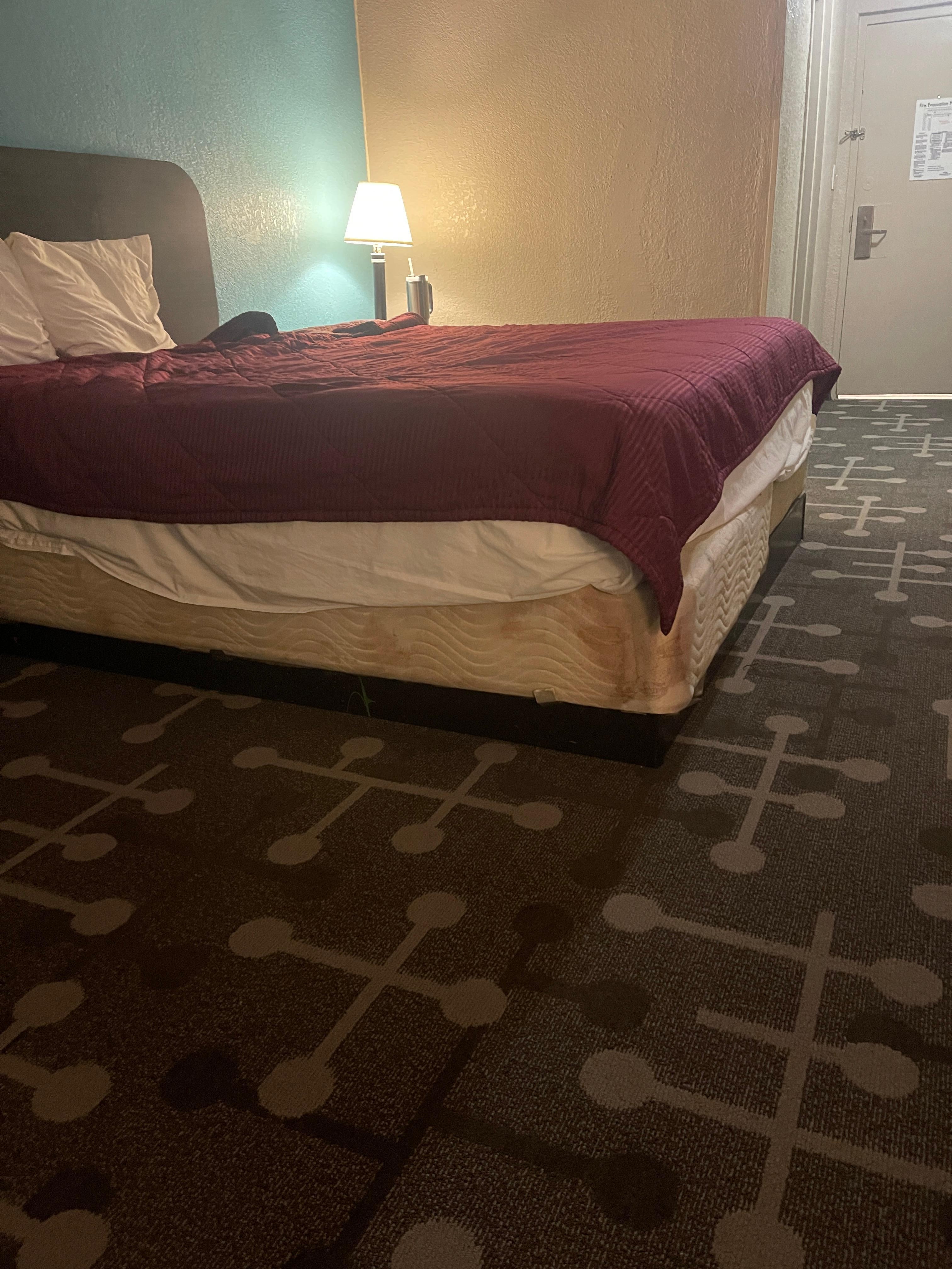 Blood stains on the box spring.