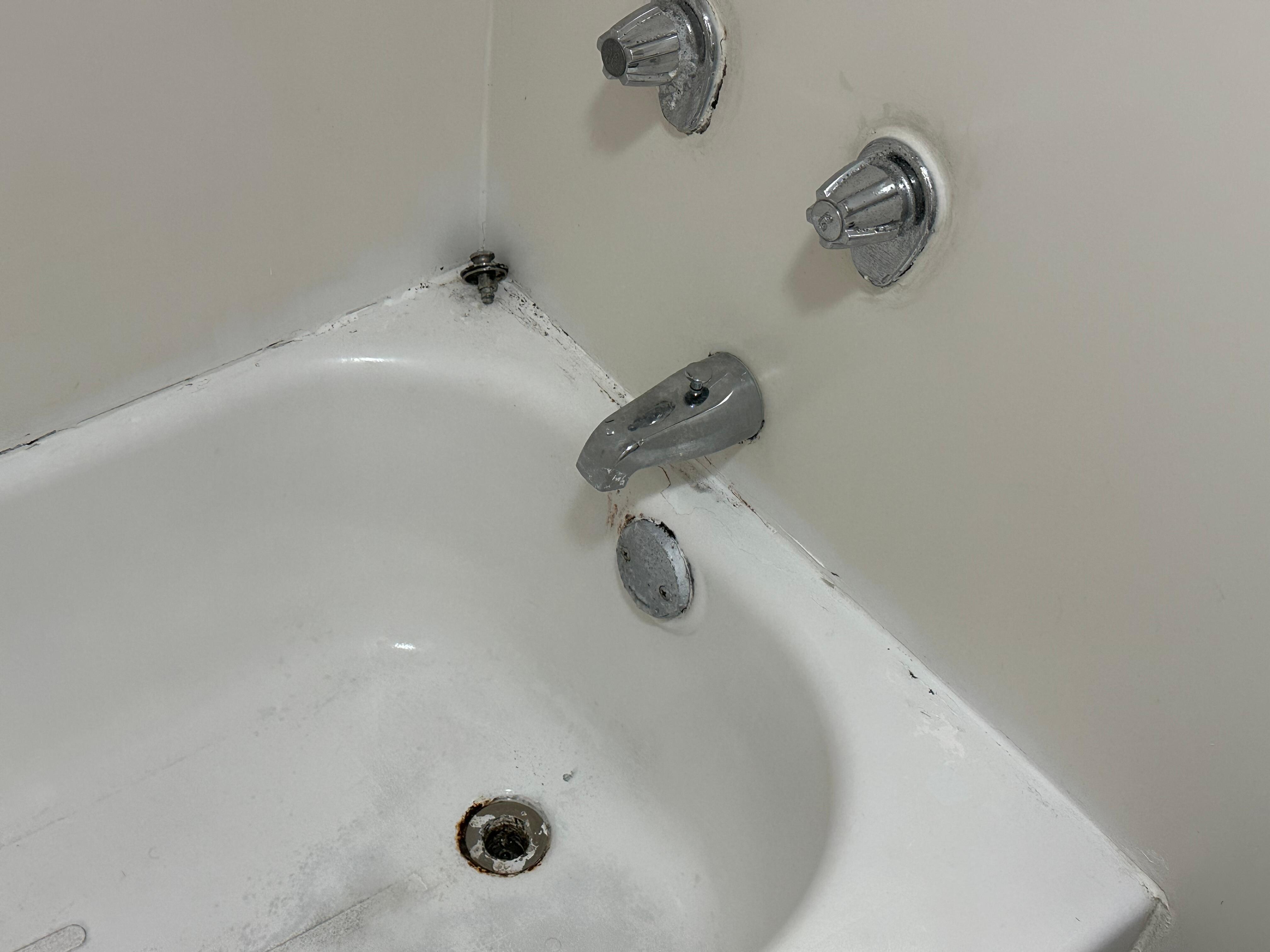 Gross tub, ancient fixtures.