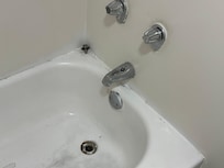 Gross tub, ancient fixtures.