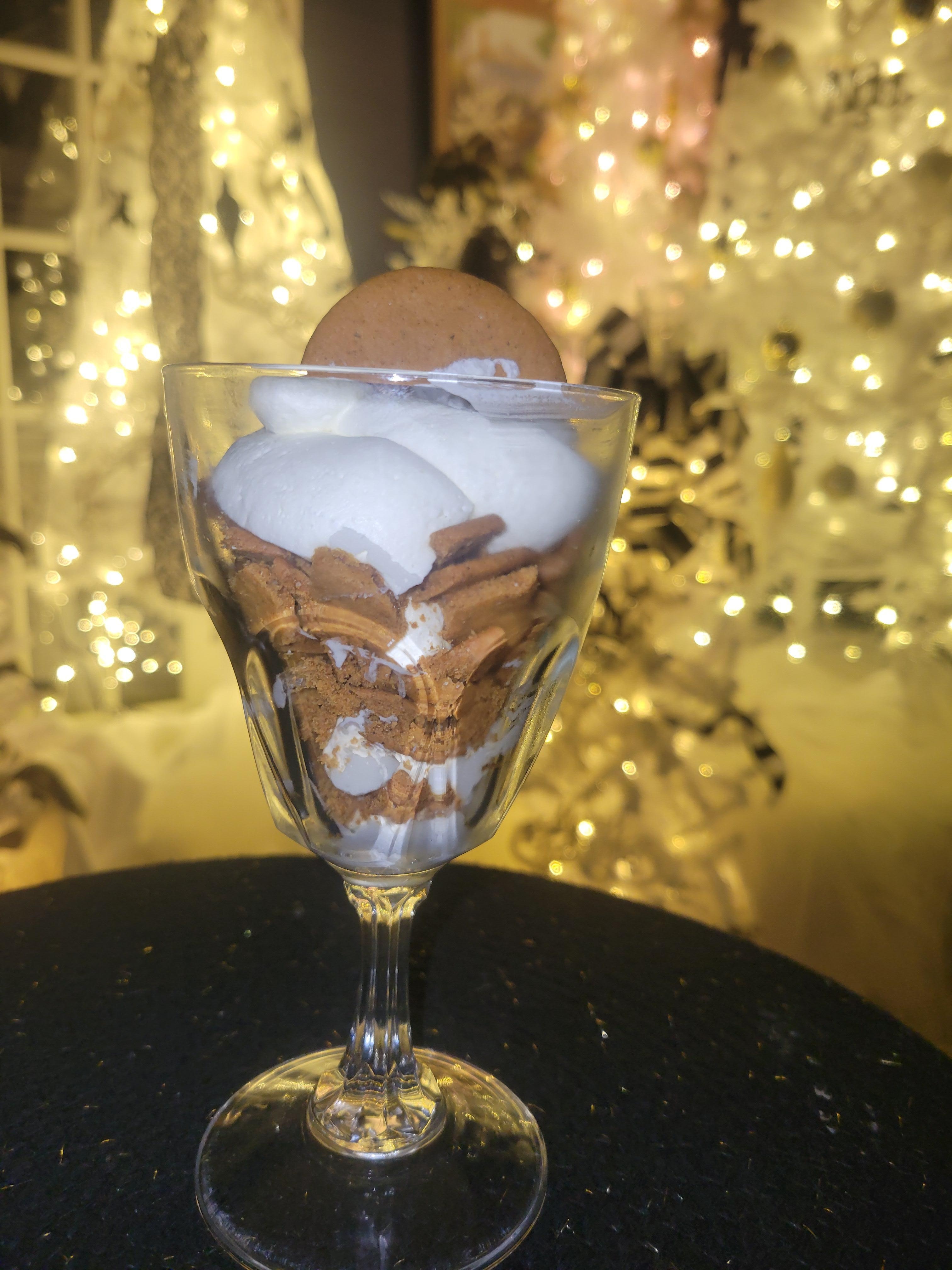 The complementary Ginger-Snap Parfait in front of some Christmas decorations.  Beautiful and delicious!