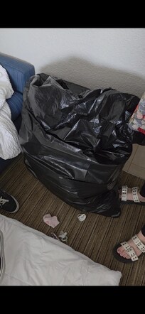 The giant bag of trash we accumulated because we had no room service to come get it