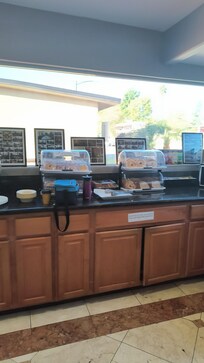 Good variety of breakfast items: bagels, pastries, yogurt, coffee, juice, milk, fruit