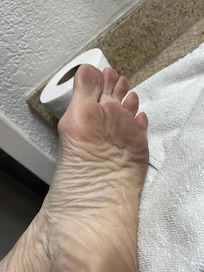 After shower walking on floor in night to use bathroom,