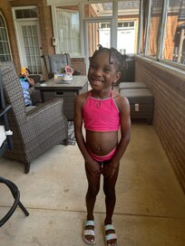 Marlee on sun porch taking.a break