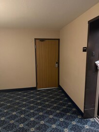 Dark hallway waiting for elevator