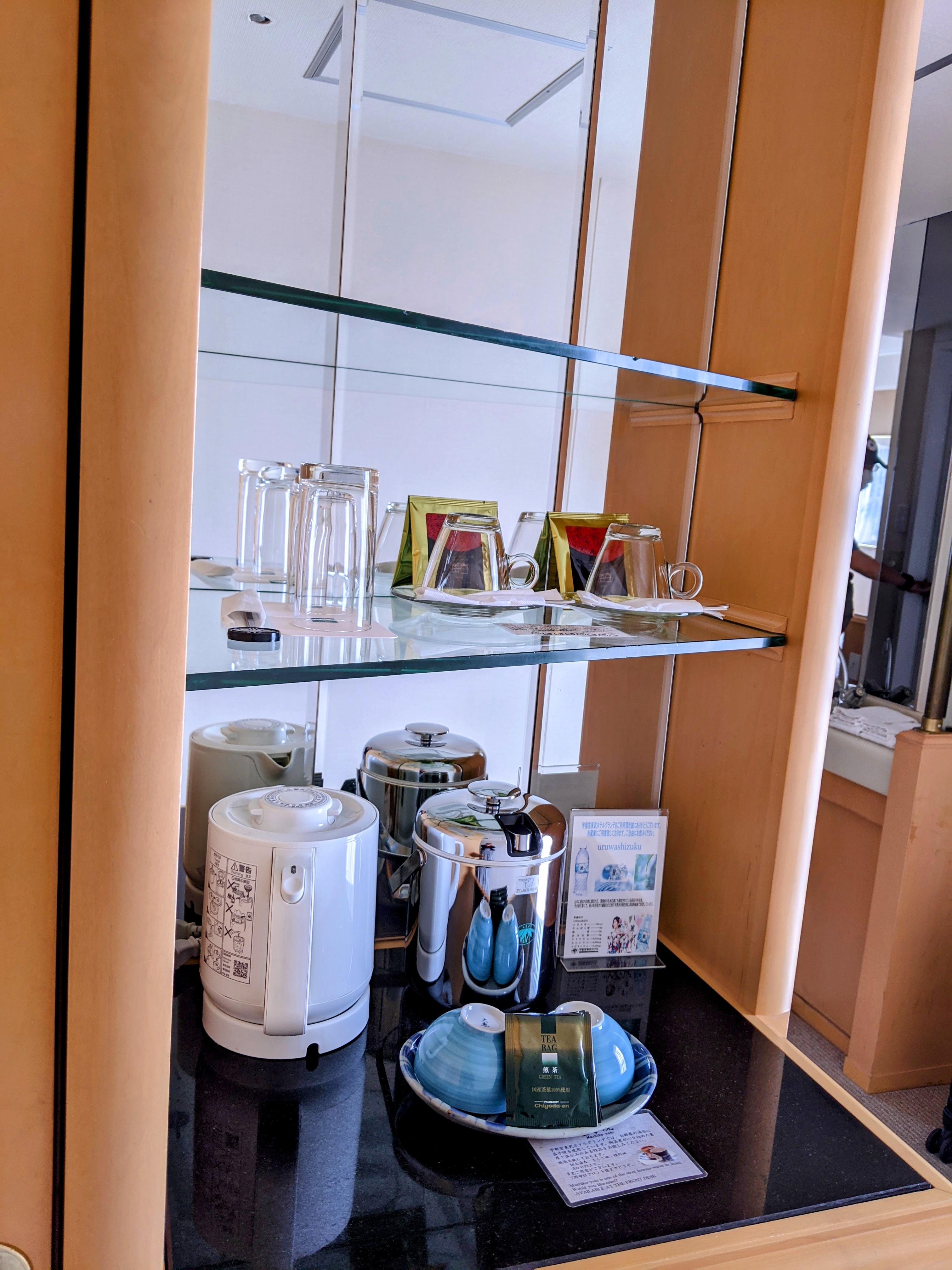 Counter with tea, free bottled water everyday