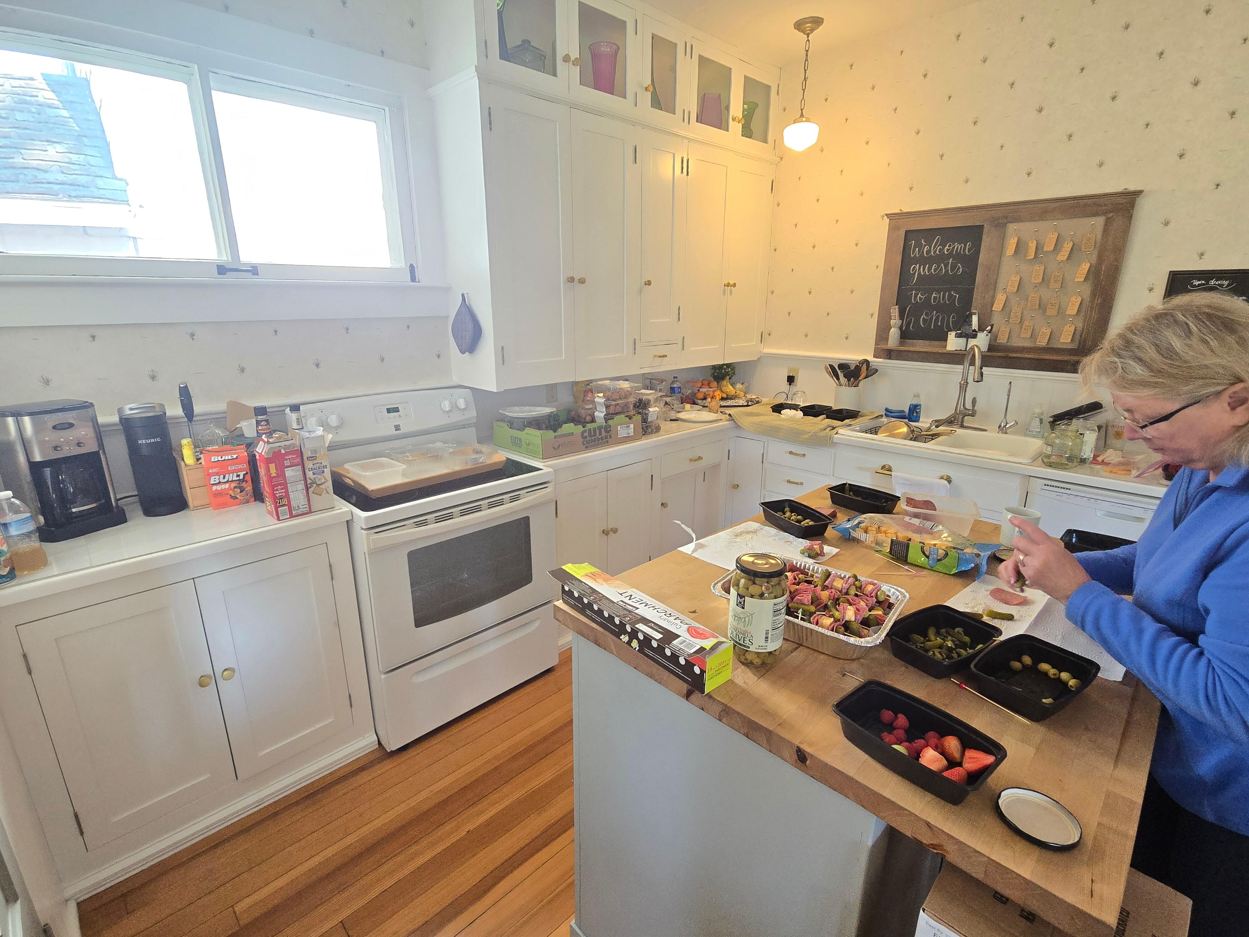 Spacious, fully-stocked kitchen.