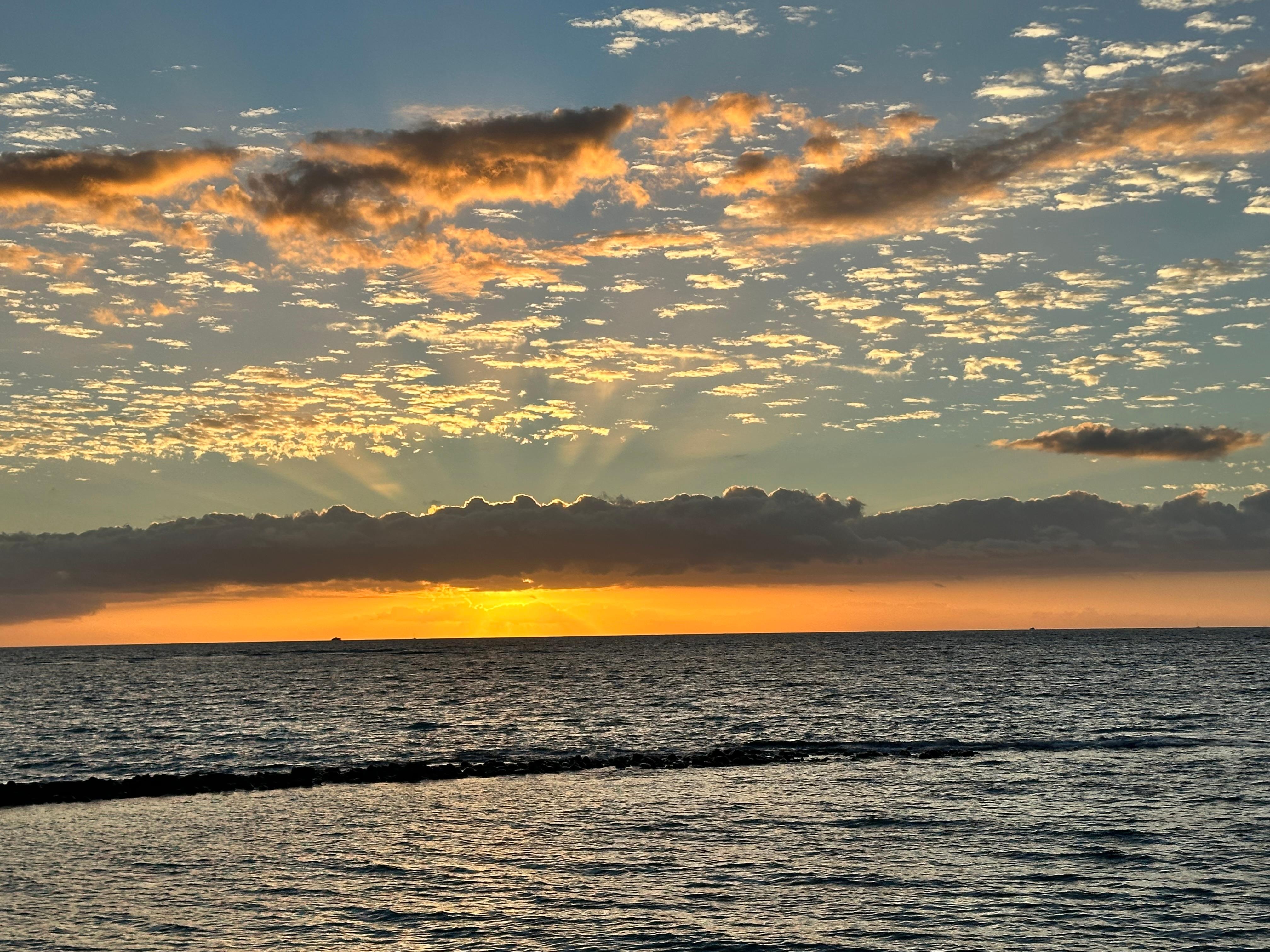 Sunset across the ocean off the lanai.  