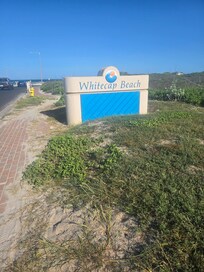You can see this sign from the porch just hop skip and a jump from the beach