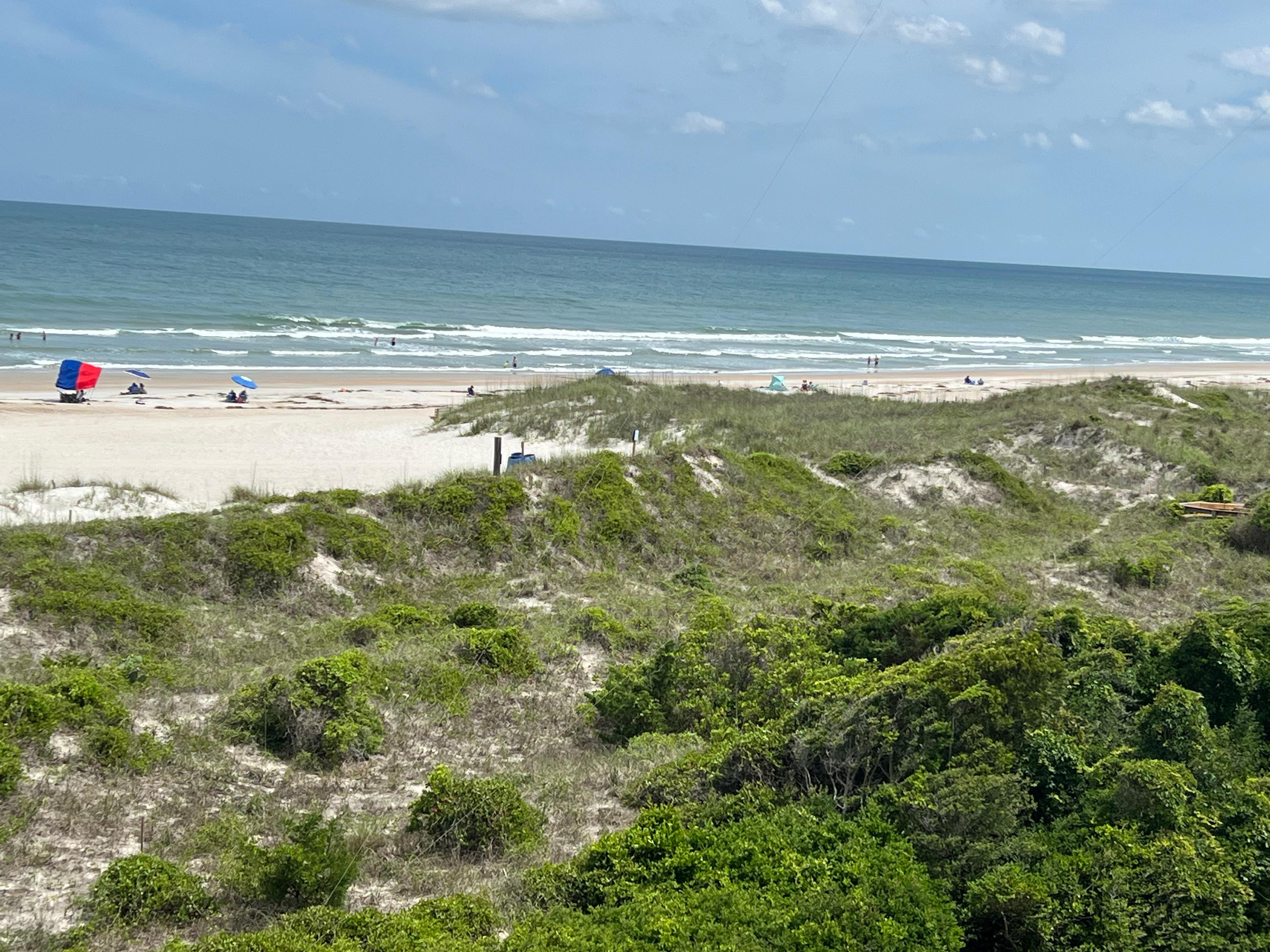 Down the beach from the balcony.
