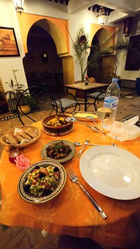Chicken Tajin, aubergine zalouk, tomato salad.